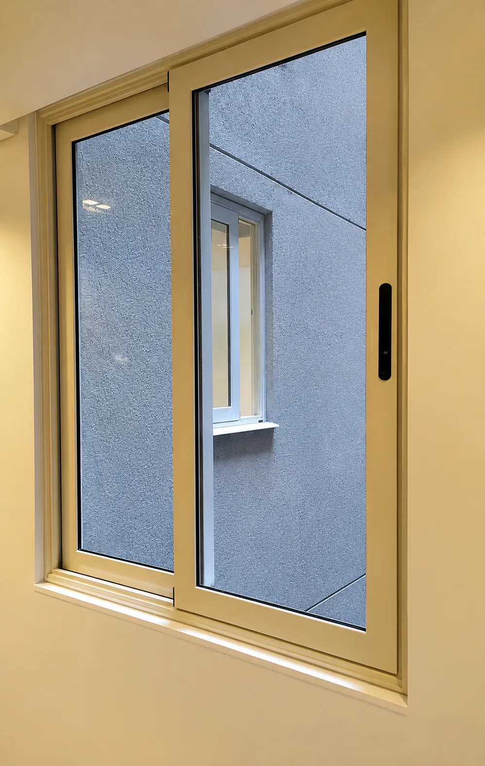 Ventana corrediza, perfil champaña
